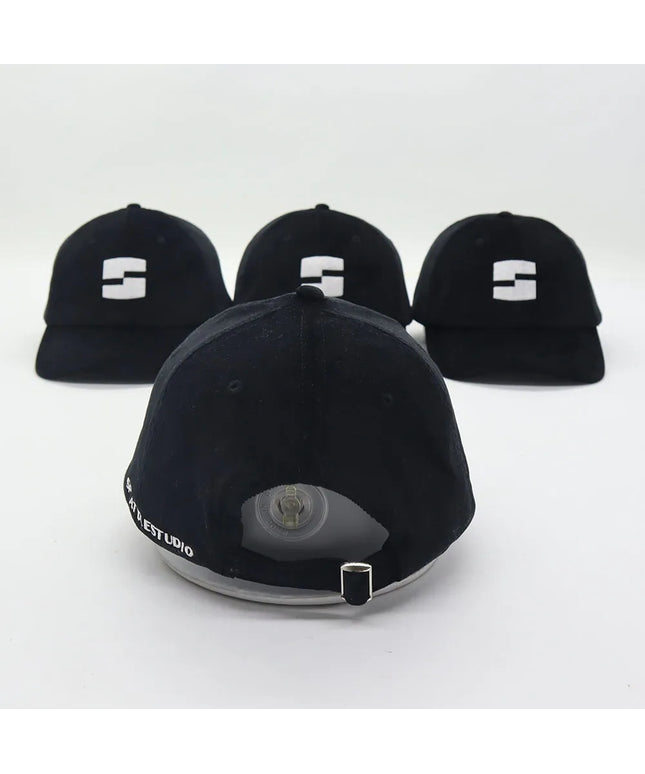 black “splattlestudio” dad hat