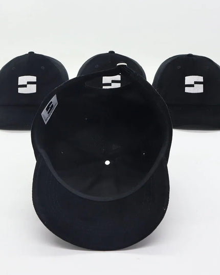 black “splattlestudio” dad hat
